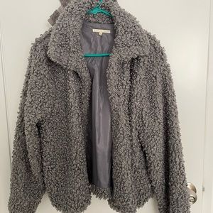 Grey - faux fur-like coat.